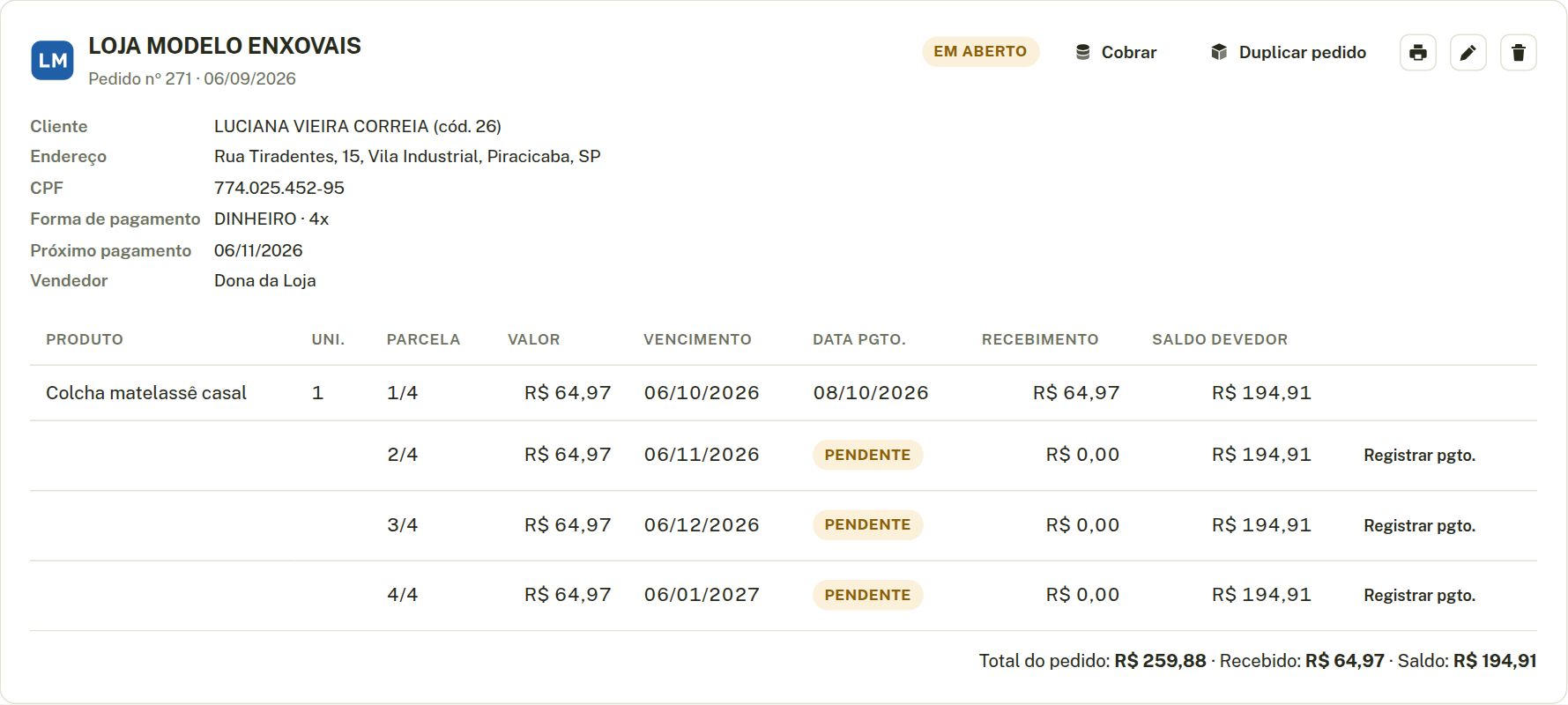 Ficha de um pedido em 4 parcelas: vencimento de cada parcela, a primeira paga e as outras pendentes, com o botão Cobrar